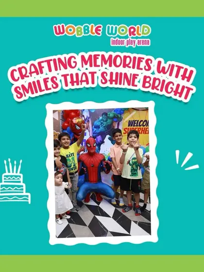 Crafting memories with smiles that shine bright. A group of kids poses happily with our Spiderman mascot.