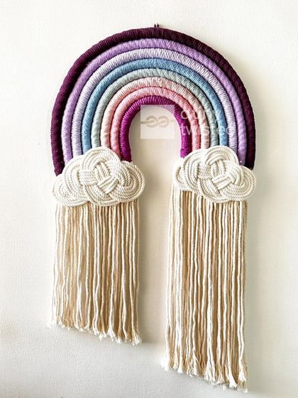 For those who love a softer palette, this rainbow with shades of purple, lavender, and pink is a dreamy and calming addition to any room.