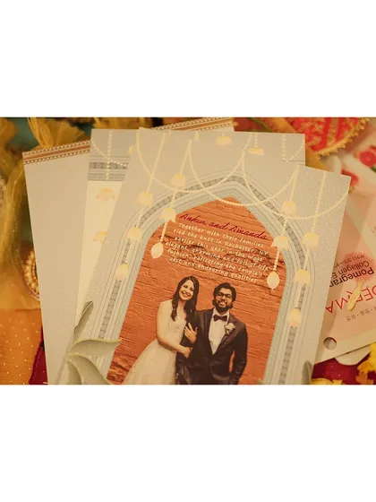 A shot of the beautiful wedding invitation for Amanda and Ankur, which features a photo from their pre-wedding shoot. Capturing details like this helps to tell the complete story of the wedding.