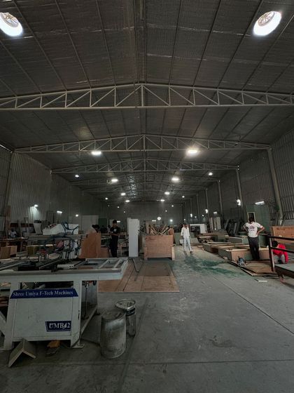 This is where the magic of our furniture comes to life. A wide shot of our factory, where our team of talented artisans and craftsmen transform creative ideas into beautifully executed pieces.