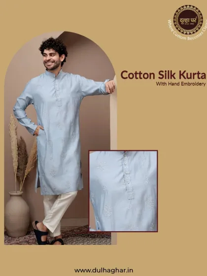 A beautiful pastel blue cotton silk kurta with delicate hand embroidery, offering a cool and calming aesthetic.