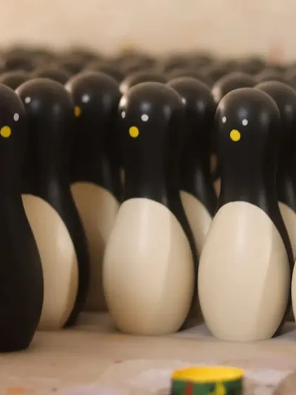 An army of our handcrafted penguin toys, ready to find new homes. Made from sustainable Ivory wood and finished with a smooth, non-toxic lacquer, these toys showcase the modern designs our artisans create while staying true to traditional methods.