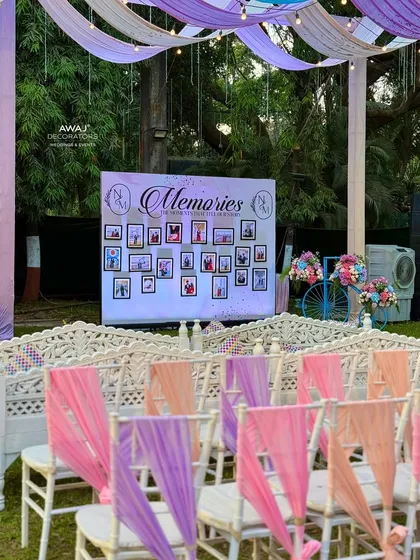 A "Memories" wall at a pastel-themed event, where guests can reminisce over the couple's journey.