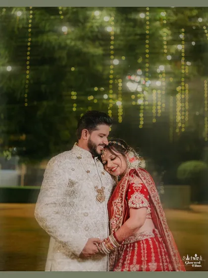 In the quiet moments after the vows, the real story unfolds. I focus on capturing the gentle, unscripted connections between a couple, like this tender embrace under soft lights. These are the portraits that you will cherish for a lifetime.