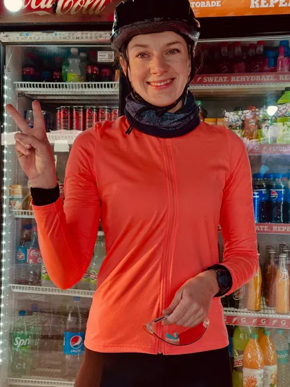 A quick peace sign for the camera during a pit stop.