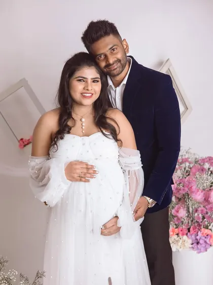 So much love in one photo. This couple's session was filled with smiles and sweet glances, set against our bright and airy floral setup.