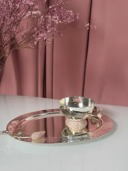 A beautifully styled tray from my Rose Quartz Collection. The hammered silver bowl rests on a rose quartz base, creating a piece that is both functional for serving and stunning for display.