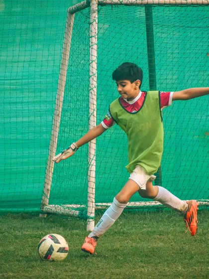 A goalkeeper practices his kicking technique, a vital skill for modern keepers to initiate attacks.
