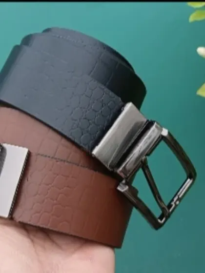 I offer reversible belts that give you two color options in one. This one has a black textured side and a smooth brown side.