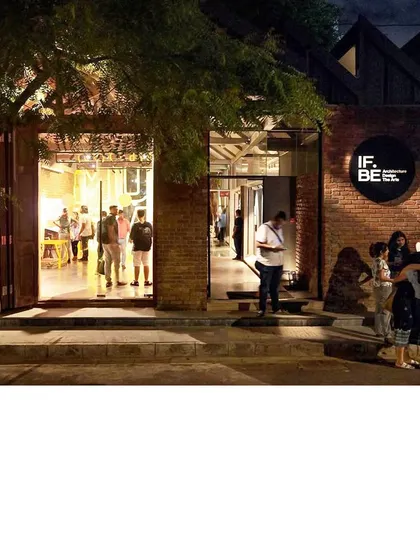 At night, the restored IF.BE space reveals its new life as a cultural hub. This project was an act of urban archaeology, transforming a derelict ice factory into a public space for art and discourse, proving that preservation is a powerful form of sustainable development.
