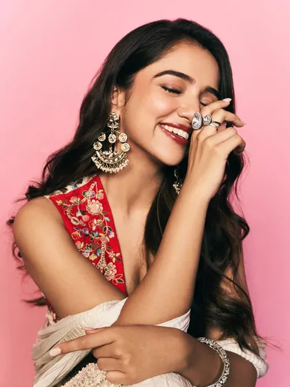 The joy of styling for major brand campaigns. This is a vibrant look for Ahsaas Channa for a Myntra shoot, featuring a modern ethnic sharara set with beautiful red floral embroidery and statement chandbali earrings.