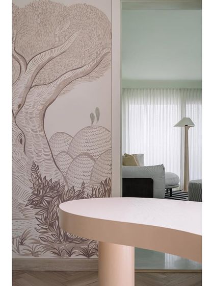 This hand-painted wall mural in a den at Eden House creates a visual connection to the outdoors, making the time spent in this area very enjoyable.