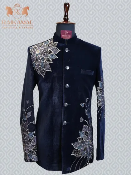 A classic navy blue velvet Bandhgala jacket, elevated with beautiful floral threadwork embroidery. This is a timeless piece, styled with class.