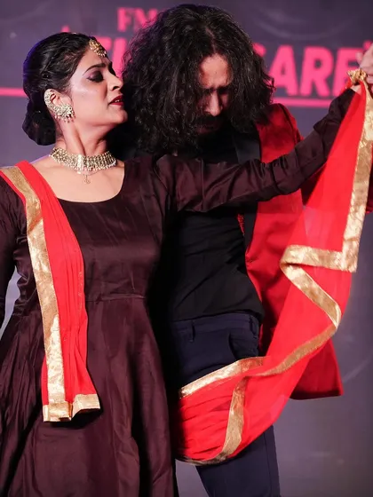A moment of intense connection during our performance. The Flamenco and Kathak fusion is not just about steps, but about the shared story we tell on stage.