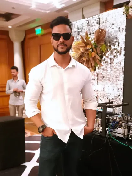 A quick moment before the party starts. I believe in bringing positive energy to every event, ready to create a memorable night for everyone on the dance floor.