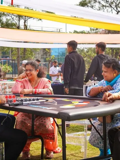 A casino-themed party is a great way to entertain guests. Here, family members are enjoying a game of poker at one of the tables I set up for the event.