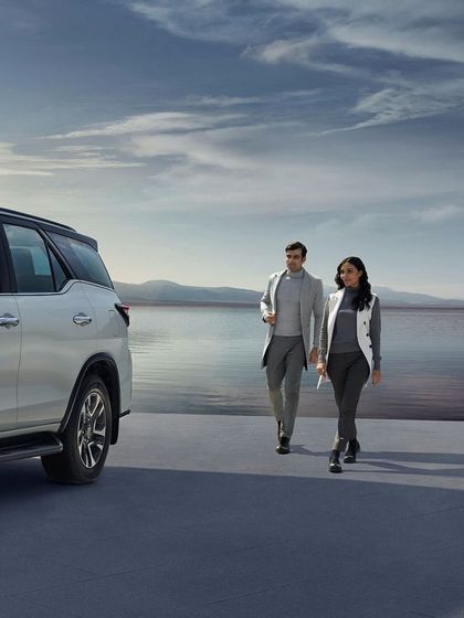 A sophisticated take on automotive styling for the Toyota Legender campaign. I dressed the models in smart, coordinated grey outfits to match the car's sleek design, creating a look of modern, professional travel.