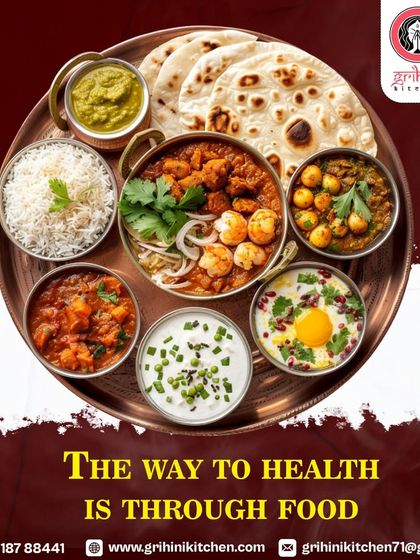The way to health is through food. This beautiful thali showcases a variety of dishes, including curries, rice, raita, and roti, all part of a balanced diet.