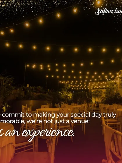 We commit to making your special day memorable from day to night. This evening shot shows the venue lit up with string lights.
