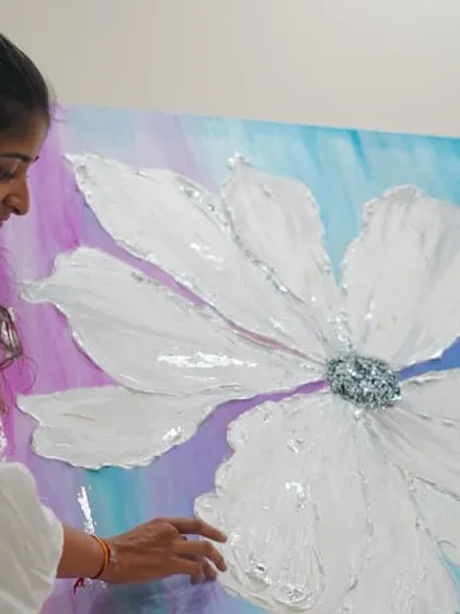 My art became my safe space when I felt lost. Each color and shape in this textured floral painting comes from a place of healing. The canvas allows me to turn difficult emotions into something beautiful and tangible.