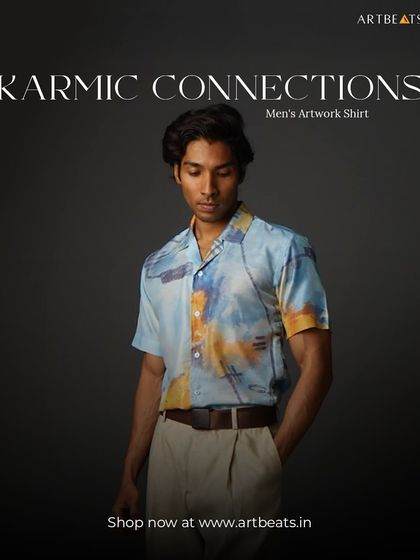 A studio shot of the Karmic Connections men's artwork shirt. The abstract, painterly design is printed on a soft, breathable fabric, making it a comfortable and stylish choice.
