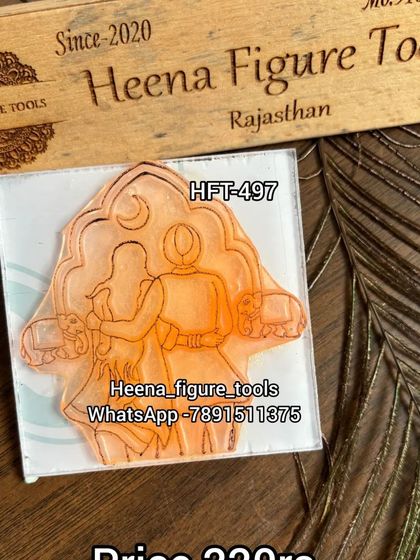 A romantic stamp for Karwa Chauth, showing a couple in an embrace with elephants in the background. This design has a very royal and festive feel.