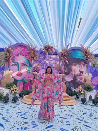 Embracing the festive vibe of the Haldi carnival with open arms.