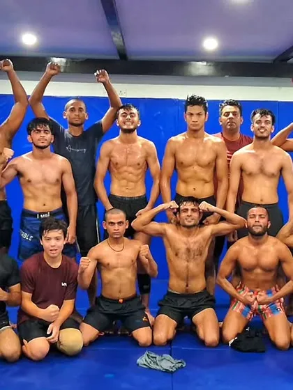 This is the squad after a tough Wrestling Wednesday session. Look at these guys. We have a mix of pros and beginners, all grinding together on the mats. There's no ego here, just a shared goal of getting better every single day. This is the community you’ll be a part of.