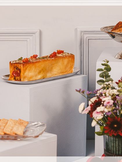 Celebrate Diwali in style with our luxurious hampers. This image highlights our savoury croissant loaf, a perfect blend of tradition and taste.