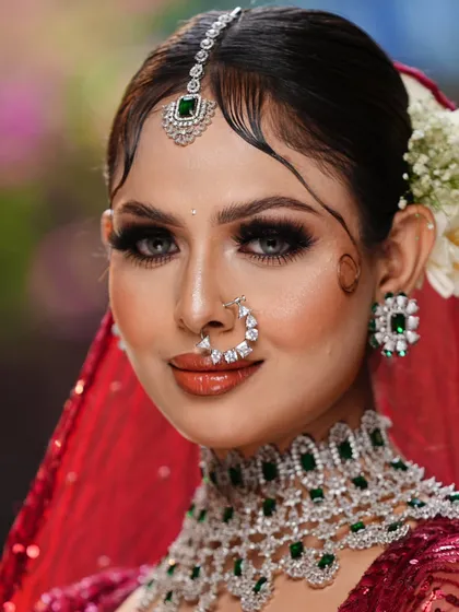 A timeless bride is always in style. This portrait, created by one of my students, showcases the classic red and green bridal palette, complete with flawless skin, defined eyes, and elegant styling that you will learn to perfect.