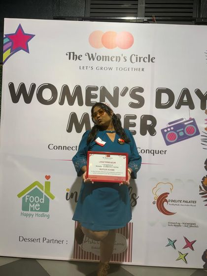 Posing with my award from The Women's Circle. This recognition means so much to me as a first-generation entrepreneur.