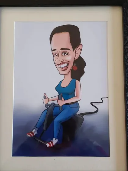 The quirky "mouse rider" caricature, beautifully framed and ready to be gifted. A fun piece of office decor that is sure to be a conversation starter.