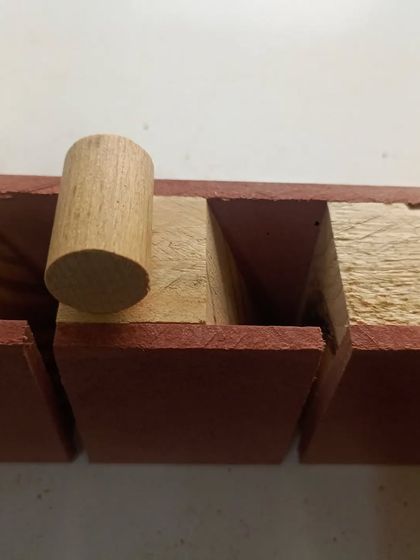 A saw till I made to organize my hand saws and other long tools. The dowels and dividers keep everything separated and easy to grab.