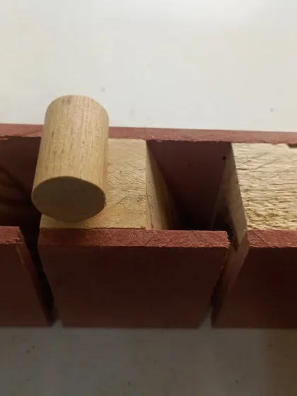A saw till I made to organize my hand saws and other long tools. The dowels and dividers keep everything separated and easy to grab.