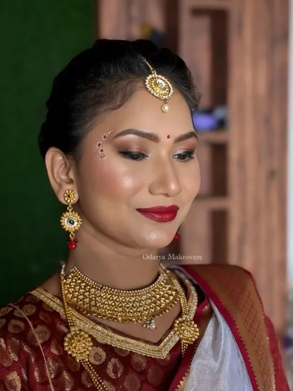 A beautiful "Radha" inspired look for a mom attending her kids' school performance. The makeup is traditional and elegant.