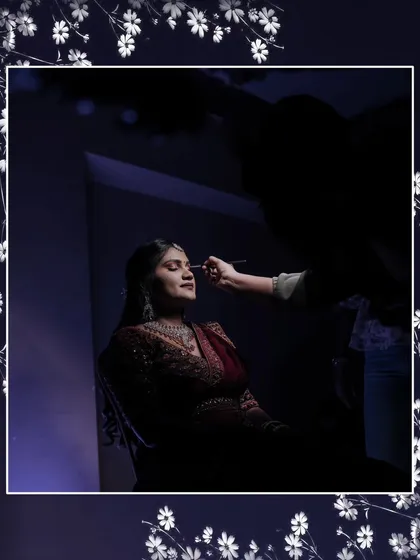 A silhouette of a bride getting her makeup done. We capture these getting-ready moments to tell the full story of your day.