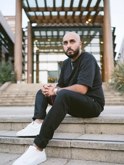 Taking a moment to think on the steps. The journey to success is a marathon, not a sprint.