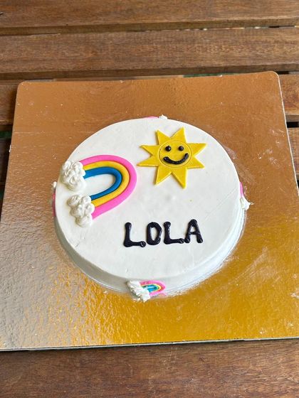Our rainbow and sunshine cake for Lola is perfect for celebrating Pride Month, or just for brightening any day. All colors are natural and pet-safe.