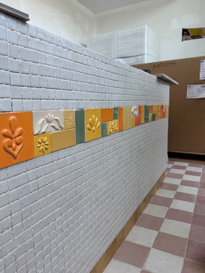 Woodwork, mockups, and custom tiles coming together on-site at our project in Mina Port, Abu Dhabi. This shows our process of testing and refining details before final installation.