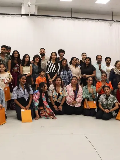 This is my tribe. A group photo with all the amazing students and their supportive families after our first showcase. The sense of community and shared joy is the best part of my job.