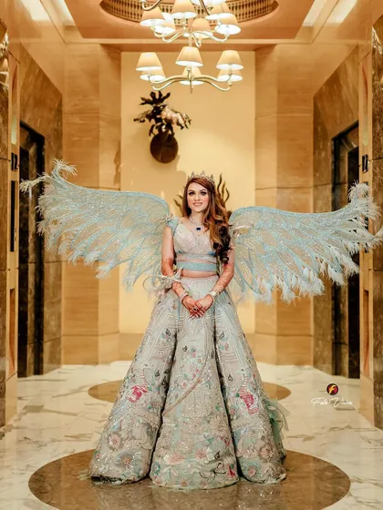 For the bride who wants to make a statement. We love working with unique concepts like this angel-winged lehenga to create fantastical, high fashion portraits that are both artistic and deeply personal.