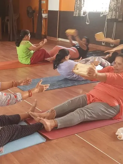 A fun moment from a partner yoga session. Working with a partner can help you engage your core more effectively and add an element of play to your practice.