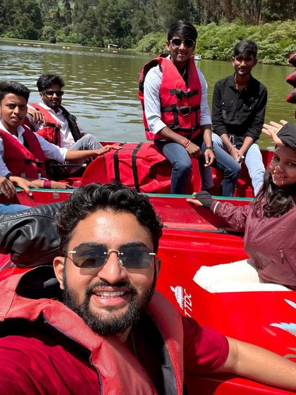 A selfie with the crew while boating on Ooty Lake. Everyone is all smiles on a sunny day out on the water.