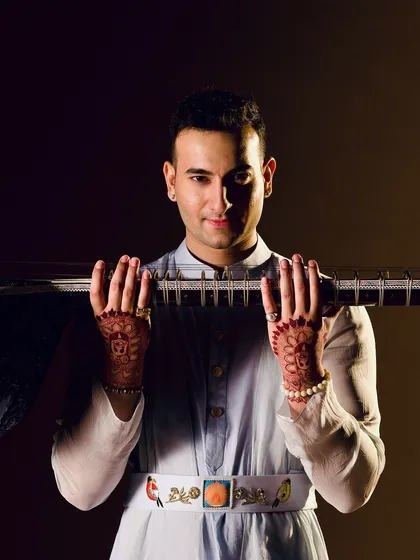 A portrait celebrating 1 million followers. The custom belt and hennaed hands are key elements of my signature style.