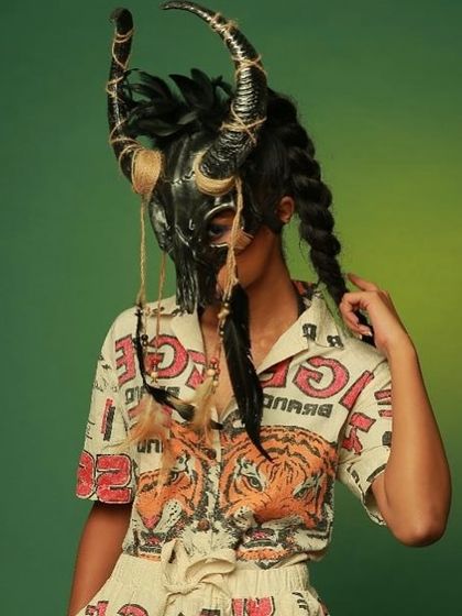 An avant-garde look for Diseno.in, featuring a dramatic mask and printed shirt. My studio is a space for creative experimentation, perfect for brands that want to push boundaries with their visuals.