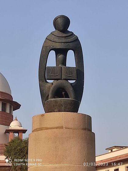 The "Mother India" sculpture by Chintamoni Kar at the Supreme Court, symbolizing the nation protecting the law of the land.
