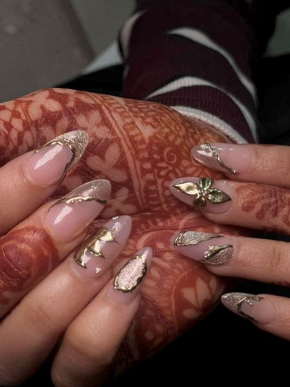 A close-up of the 3D gold flower and delicate chrome work. I love creating these custom, high-fashion looks for my brides.