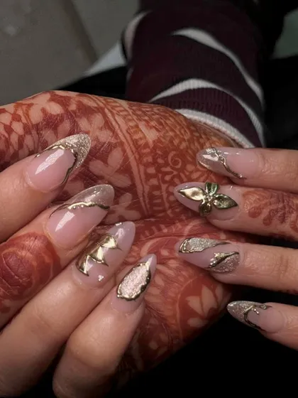 A close-up of the 3D gold flower and delicate chrome work. I love creating these custom, high-fashion looks for my brides.