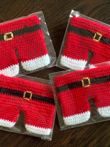 A set of Santa pants cutlery holders, packed and ready to go to a client.