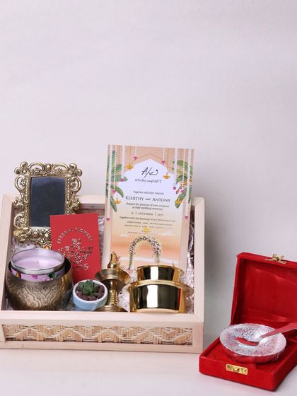 The full wedding invitation hamper, showcasing how I combine the formal invitation with a curated selection of luxury gifts.